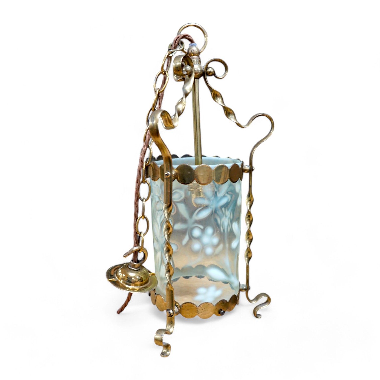 An English Arts and Crafts brass lantern with Vaseline cylinder shade decorated with flowers, including chain and ceiling rose, c.1900-1920's, wired, lantern 37cm high, shade 18cm high, 11.5cm diameter. Condition - fair